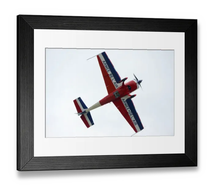 Framed Print : Fighter pilot and aerobatic, Captain Pierre Varloteaux performs in his Extra 330