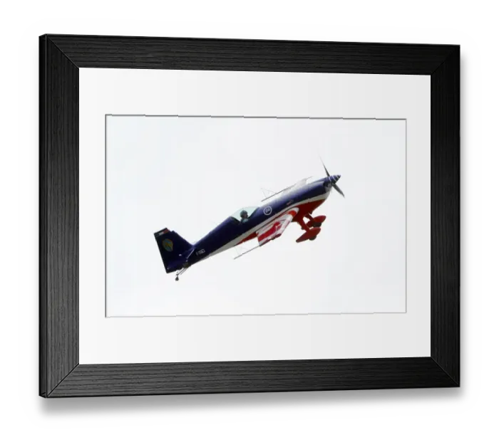 Framed Print : Fighter pilot and aerobatic, Captain Pierre Varloteaux performs in his Extra 330