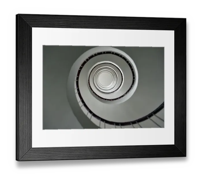 Framed Print : A picture taken on February 24, 2016 shows a spiral staircase in Nantes, western France