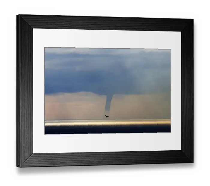 Framed Print : A waterspout forms on the horizon above the Mediterranean sea, off the coastal city Framed Print : A waterspout forms on the horizon above the Mediterranean sea, off the coastal city