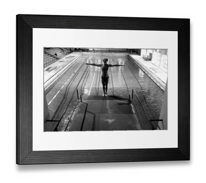 Framed Print : BLACK AND WHITE VERSION Italian diver Marco Fois, 52, trains at a swimming pool