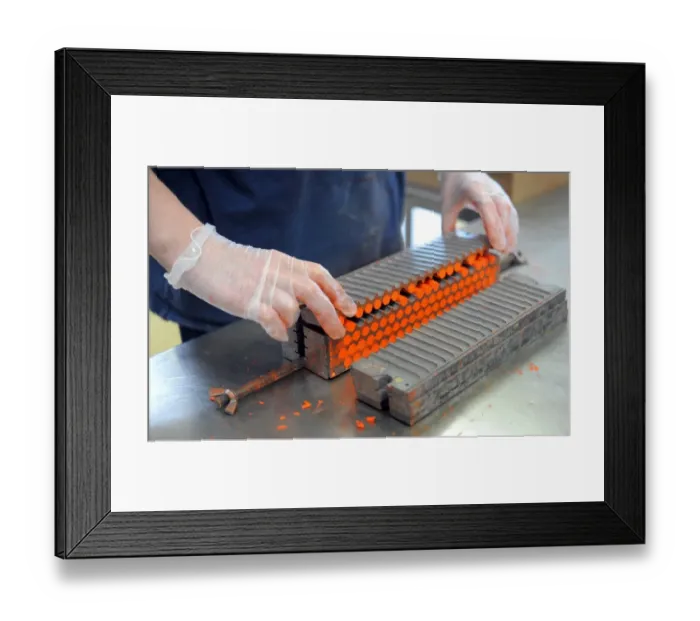 Framed Print : An employee makes pastels in a workshop at the Raphael-Isabey-Sennelier factory in Saint-Brieuc Framed Print : An employee makes pastels in a workshop at the Raphael-Isabey-Sennelier factory in Saint-Brieuc