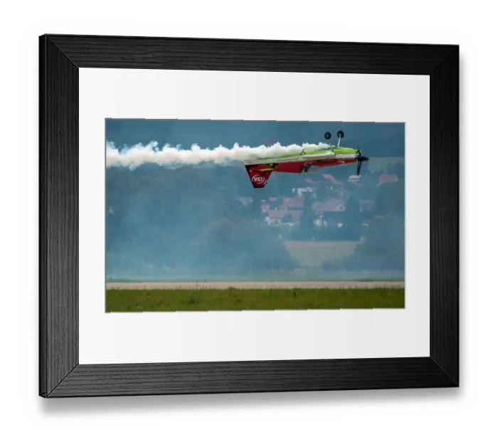 Framed Print : Legendary acrobatic pilot Zoltan Veres of Hungary on his MXS aircraft demonstrates Framed Print : Legendary acrobatic pilot Zoltan Veres of Hungary on his MXS aircraft demonstrates