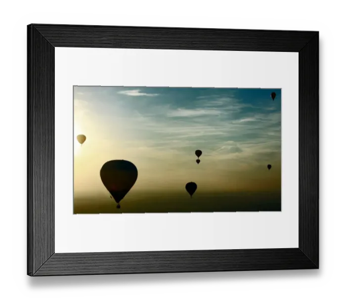 Framed Print : Hot-air balloons fly over buildings on the outskirts of Minsk on September 12, 2014 Framed Print : Hot-air balloons fly over buildings on the outskirts of Minsk on September 12, 2014