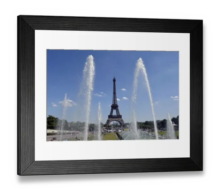 Framed Print : A picture shows a general view of the Eiffel tower on a warm and sunny day on July 3, 2014 in Paris Framed Print : A picture shows a general view of the Eiffel tower on a warm and sunny day on July 3, 2014 in Paris