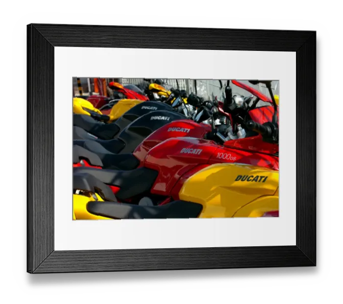 Framed Print : In this photo taken on December 15, 2011, Ducati motorcycles are on display outside