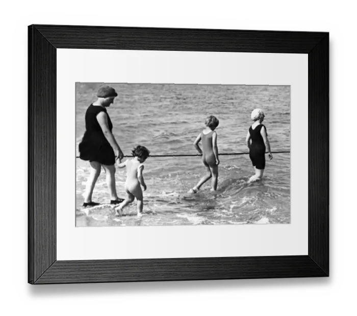 Framed Print : Family Swim Wearing One-Piece Suits Framed Print : Family Swim Wearing One-Piece Suits