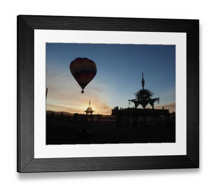 Framed Print : Hot air balloon flies over the Solar Temple at dawn at the Symbiosis Oregon Eclipse Festival Framed Print : Hot air balloon flies over the Solar Temple at dawn at the Symbiosis Oregon Eclipse Festival