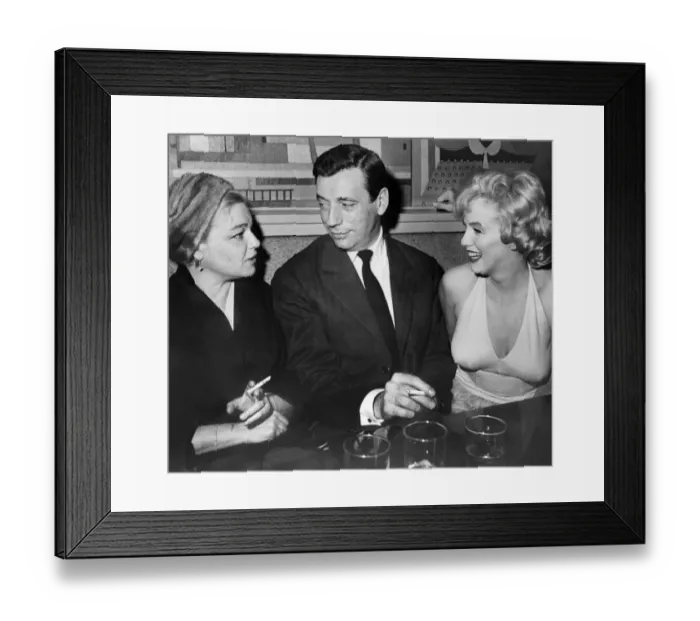 Framed Print : French actors Simone Signoret and her husband Yves Montand Chat with American Star Marilyn Monroe