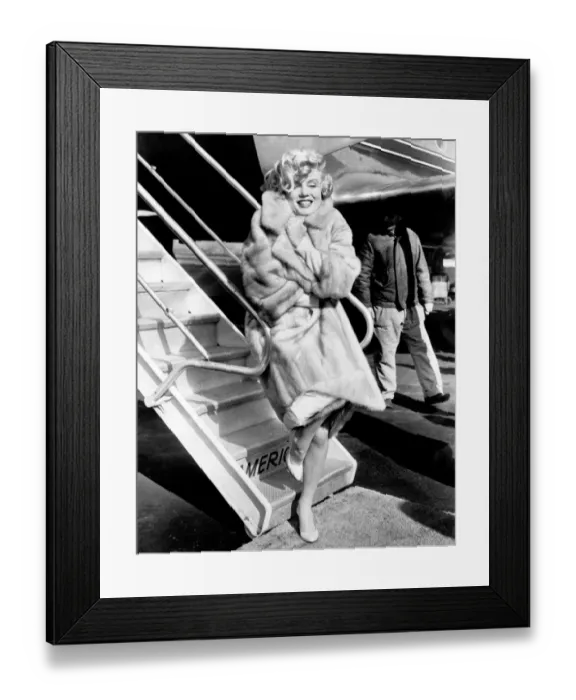 Framed Print : Marilyn Monroe Poses at La Guardia Airport Framed Print : Marilyn Monroe Poses at La Guardia Airport