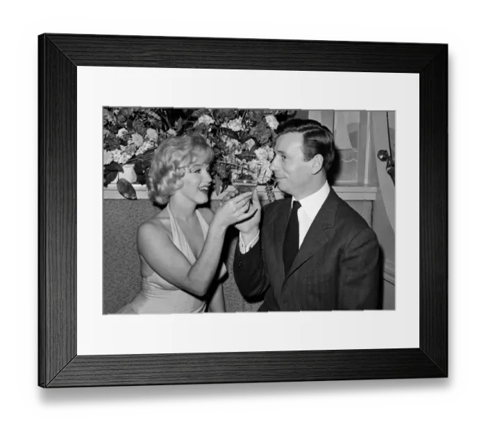 Framed Print : Marilyn Monroe and her co-star, French actor and singer Yves Montand
