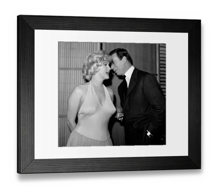 Framed Print : French Actor and Singer Yves Montand Whispers to Marilyn Monroe