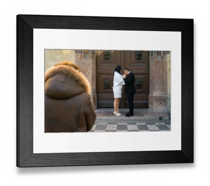 Framed Print : sz. An elderly women looks on as a Russian couple kiss on February 14 Framed Print : sz. An elderly women looks on as a Russian couple kiss on February 14