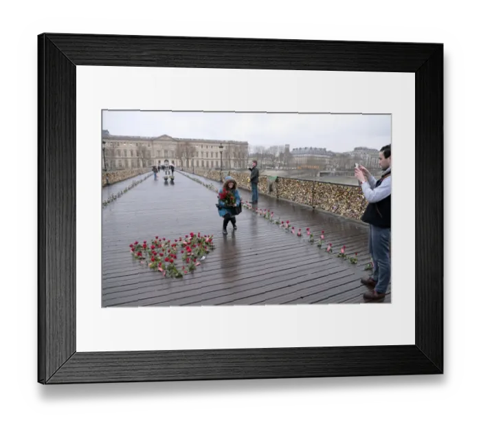 Framed Print : A woman poses for a photograph next to roses bearing an etiquette reading It s Framed Print : A woman poses for a photograph next to roses bearing an etiquette reading It s