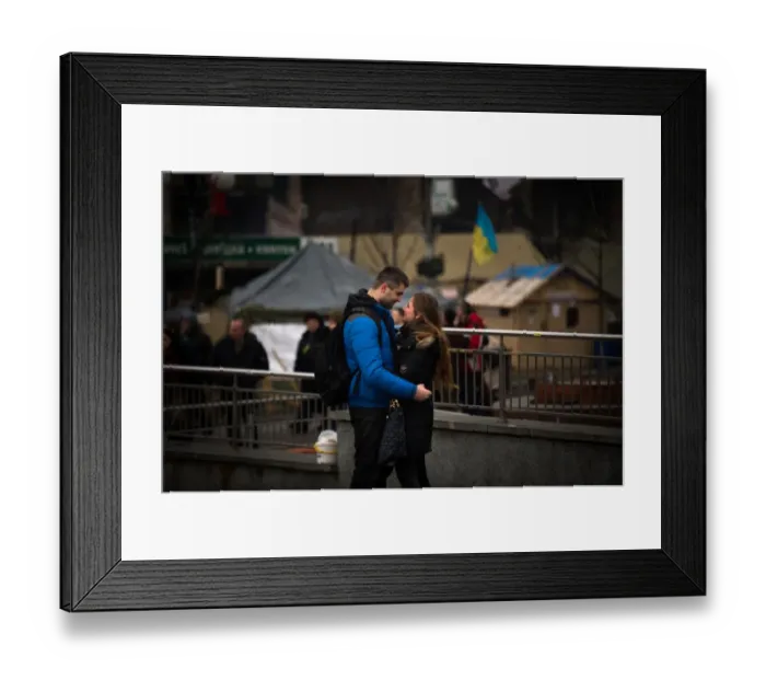 Framed Print : A couple stands on Independence square in Kiev, on February 14, 2014 Framed Print : A couple stands on Independence square in Kiev, on February 14, 2014