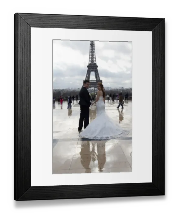 Framed Print : A Chinese maried couple poses in front of the Eiffel tower on February 25, 2014, in Paris Framed Print : A Chinese maried couple poses in front of the Eiffel tower on February 25, 2014, in Paris