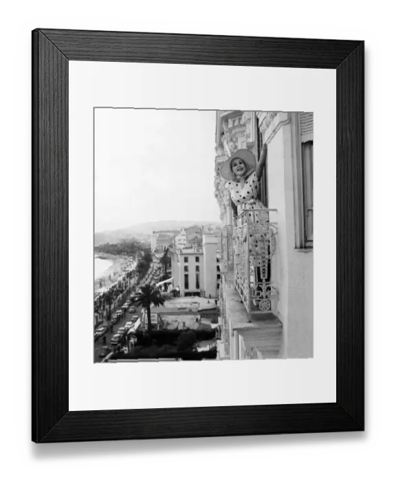 Framed Print : Zsa Zsa Gabor poses from the window of her apartment