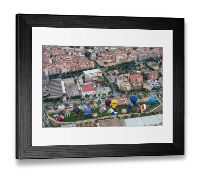 Framed Print : Hot-air balloons are inflated on ground during the 21th European Balloon Festival in Igualada Framed Print : Hot-air balloons are inflated on ground during the 21th European Balloon Festival in Igualada
