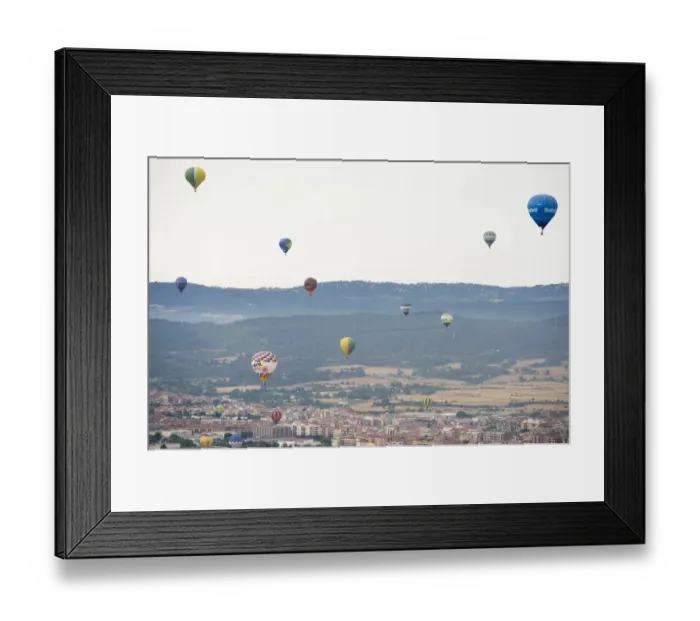 Framed Print : Hot-air balloons fly during the 21th European Balloon Festival in Igualada, near