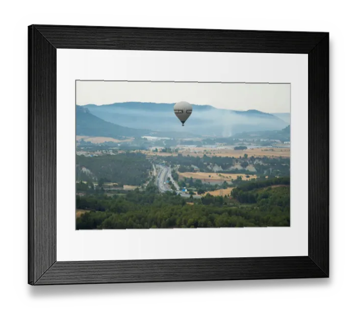 Framed Print : A hot-air balloon flies during the 21th European Balloon Festival in Igualada, near
