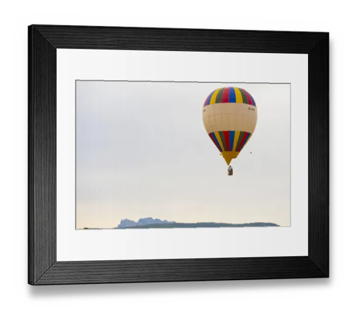 Framed Print : A hot-air balloon flies during the 21th European Balloon Festival in Igualada, near Framed Print : A hot-air balloon flies during the 21th European Balloon Festival in Igualada, near