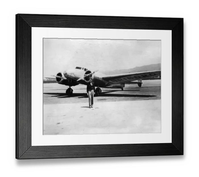 Framed Print : Amelia Earhart in front of her plane Framed Print : Amelia Earhart in front of her plane