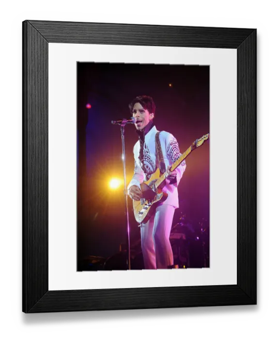 Framed Print : US singer Prince performs on October 11, 2009 at the Grand Palais in Paris Framed Print : US singer Prince performs on October 11, 2009 at the Grand Palais in Paris