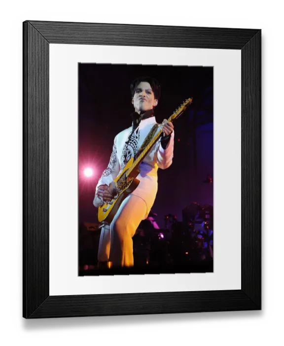 Framed Print : US singer Prince performs on October 11, 2009 at the Grand Palais in Paris Framed Print : US singer Prince performs on October 11, 2009 at the Grand Palais in Paris