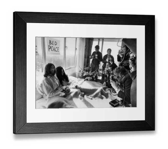Framed Print : John Lennon and his wife Yoko Ono Receiving Journalists Framed Print : John Lennon and his wife Yoko Ono Receiving Journalists