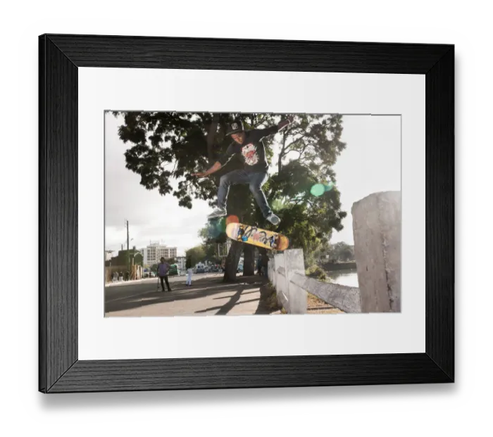 Framed Print : Malagasy skaters ride their boards through the streets on May 31, 2015 in Antananarivo, Madagascar