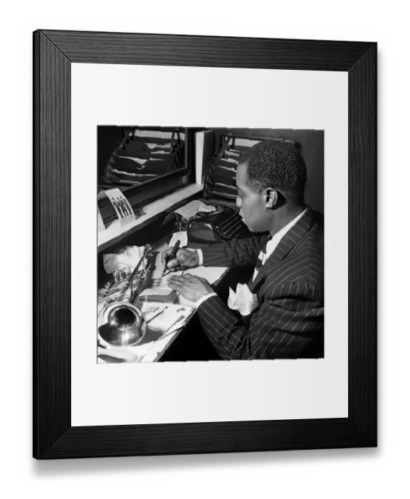 Framed Print : Louis Armstrong, writing a partition in his dressing room Framed Print : Louis Armstrong, writing a partition in his dressing room