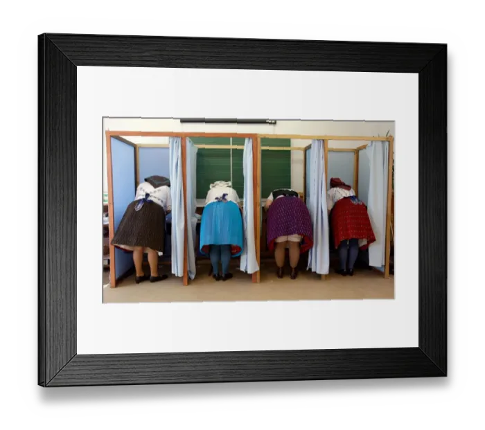 Framed Print : Women dressed in traditional Hungarian outfit prepare their votes in a polling station Framed Print : Women dressed in traditional Hungarian outfit prepare their votes in a polling station
