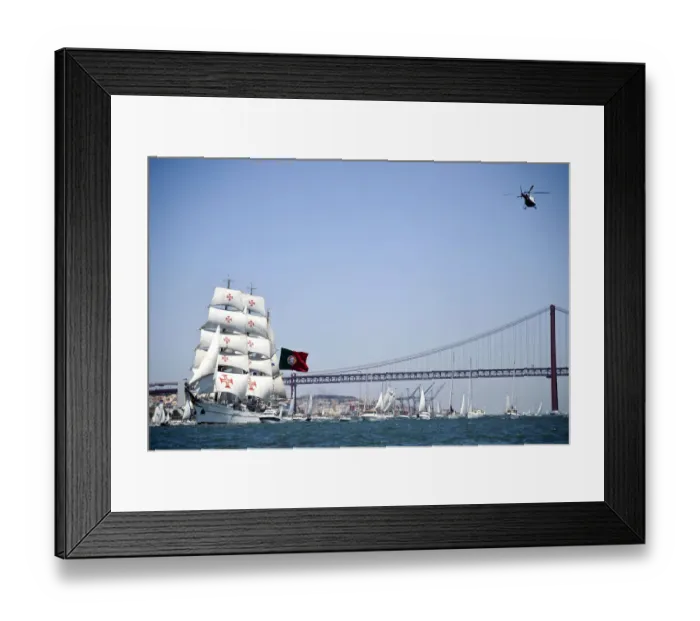 Framed Print : Portuguese sailing boat Sagres sails in Tejo River in Lisbon on July 19, 2012, during
