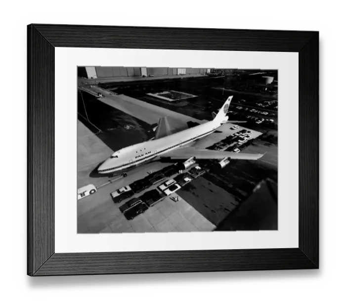 Framed Print : Aerial view of Boeing 747, called also Jumbo Jet, after it is painted with Pan Am logo Framed Print : Aerial view of Boeing 747, called also Jumbo Jet, after it is painted with Pan Am logo