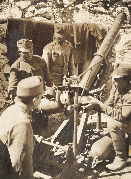 Austrian gunners loading 12cm trench mortar, WW1