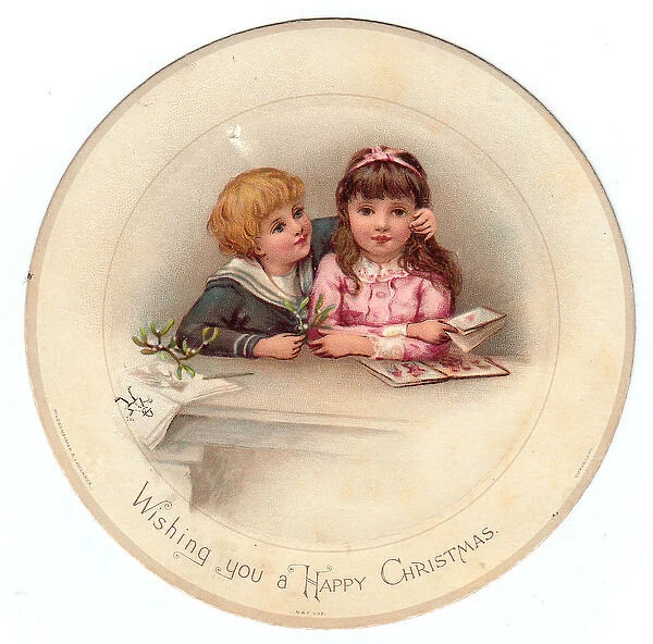 Boy and girl with mistletoe on a circular Christmas card