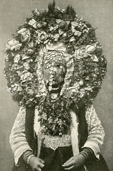 Bride wearing a traditional floral mask, Bulgaria