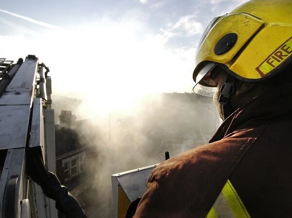 Firefighters working at scene of fire in Walthamstow