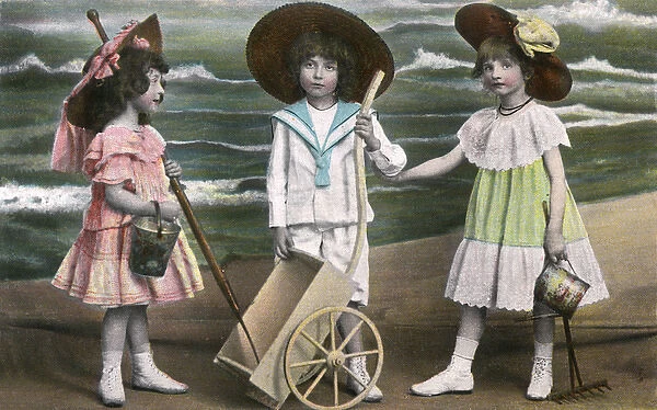 Three young children at the seaside - kitsch postcard