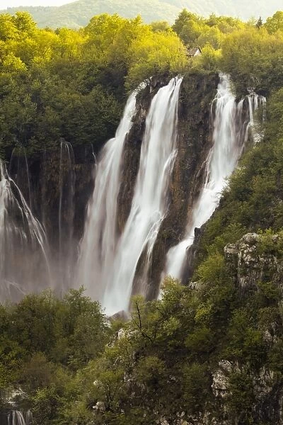 Heavy flow of water into the canyon at a large waterfall after heavy rain, Plitvice