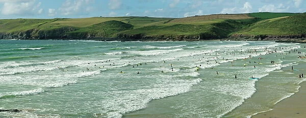 Surfers at Polzeath, Hayle Bay and the Cornish coast, Cornwall, England