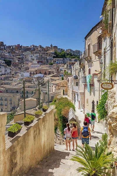 Ragusa Ibla, Sicily. People walking along the streets of the old town