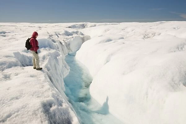 Melt water on the Greenland ice sheet near camp Victor north of Ilulissat. The Greenland ice sheet is the largest ice sheet outside of Antarctica. Temperatures have risen by nine degrees Fahrenheit in Greenland in the last 60 years due to human