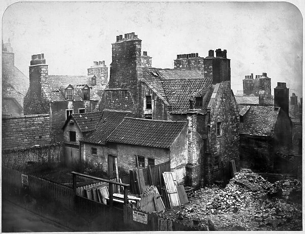 View of houses at the head of College Wynd, Edinburgh, prior to demolition. Date: 1871