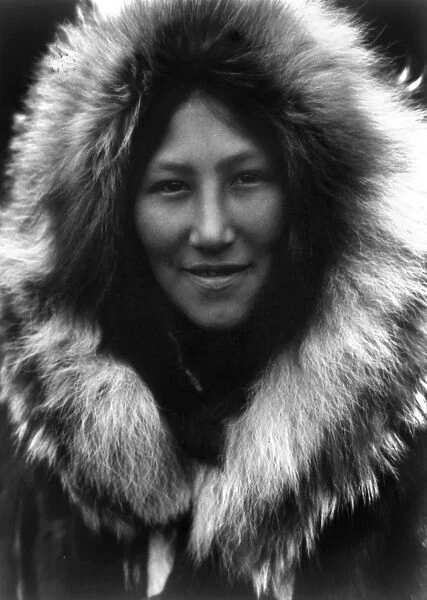 ALASKA: ESKIMO WOMAN. Noatak woman in Alaska wearing a hooded fur parka. Photographed by Edward S