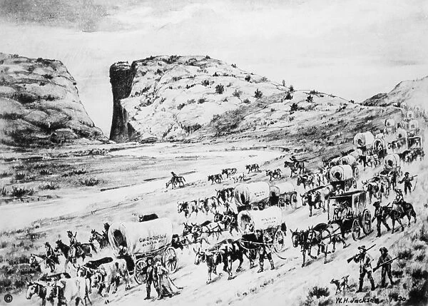OREGON TRAIL EMIGRANTS. A wagon train on the Oregon Trail following the Sweetwater