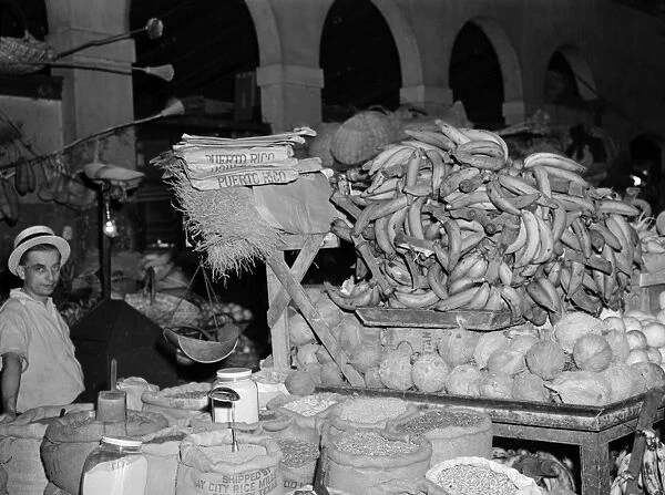 PUERTO RICO: MARKET, 1942. Bananas, coconuts, rice, beans and other produce for
