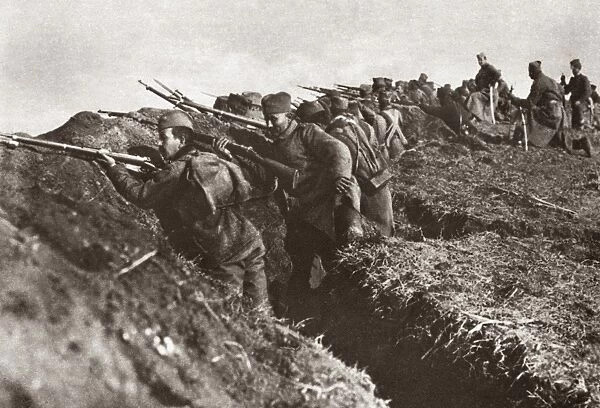 WORLD WAR I: SERBIA. Serbian riflemen in a hastily dug trench on a hill overlooking the Danube