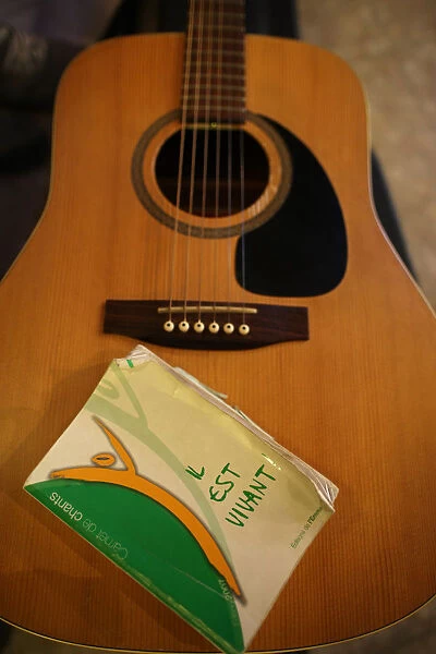 Booklet and guitar at World Youth Day 2011