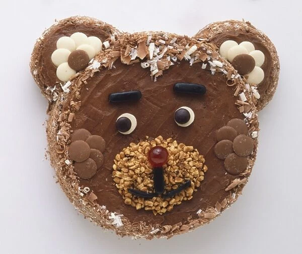 chocolate birthday cake in the shape of a teddy bear